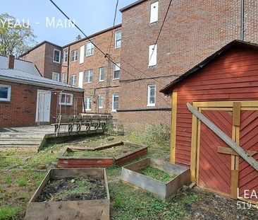 Completely Renovated 4 Bedroom 1 Bathroom Main Floor Unit - Photo 3