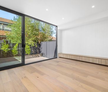 Luxury Three-Storey Townhouse in the Heart of McKinnon Secondary Co... - Photo 1