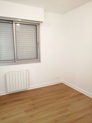 Location Appartement 3 pièces 69m² - Photo 3