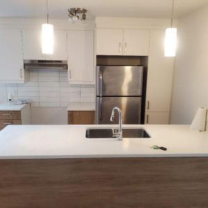 GRAND 3 ½ À LOUER DANS UN IMMEUBLE RECENT – DISPONIBLE 1ER DECEMBRE. - Photo 2