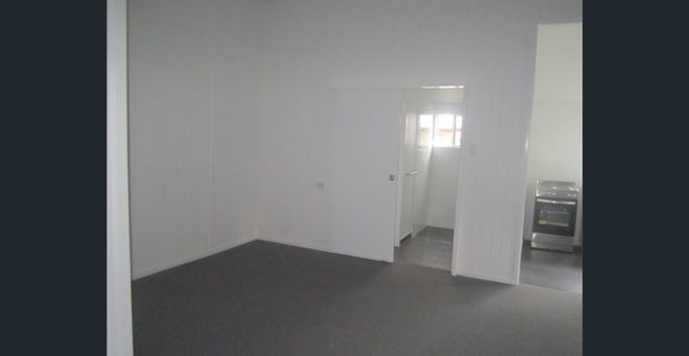 Renovated unit with no water to pay or no yard to mow - Photo 1