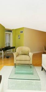 Cheerful 2 Bedroom with 2 Bathrooms plus Balcony and Hardwood Floors - Photo 3