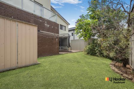 Contemporary Family Living in a Spacious Double-Brick Home - Photo 4