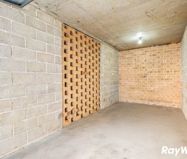 Renovated top-floor unit positioned at the rear of the complex, wal... - Photo 1