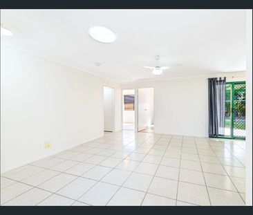 Neat & Tidy Home with Private Treed Backyard - Photo 1