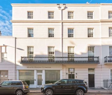 A luxuriously appointed two bedroom apartment in this converted period building in Belgravia benefitting from wood flooring and contemporary style furnishing. - Photo 1