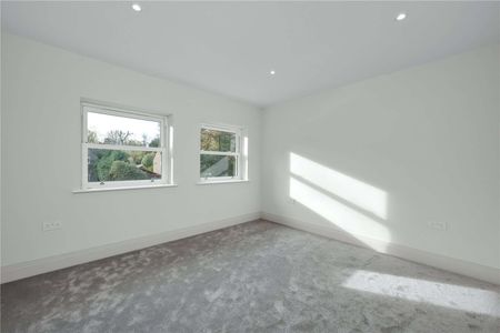 Beautifully finished new-build home just 0.5 miles from Walton-On-Thames Station. This five bedroom family residence combines contemporary design and cutting-edge technology. - Photo 5