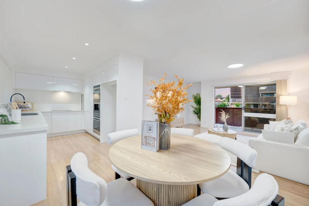 Light-Filled Family Home with Entertainer's Deck & Parkside Position! - Photo 1