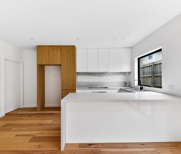 Stylish Near-New Townhouses Offering Modern, Low-Maintenance Living - Photo 6