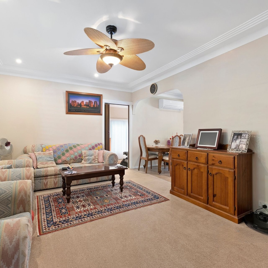 Family Home with Pool in Convenient Macquarie Hills Location - Photo 1