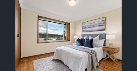 Waterfront Family Living with Tranquil Views & Spacious Split-Level Design - Photo 4