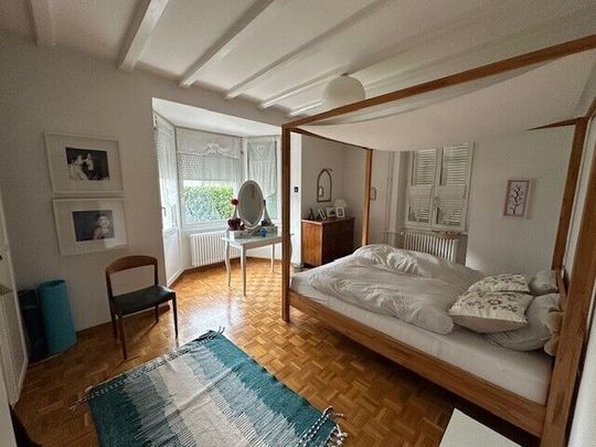 Spatieux appartement de 3.5 pièces au rez-de-chaussée avec terrasse et jardin privatif. - Photo 1