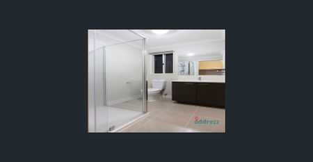 Modern Comfort and Convenience: Spacious 4-Bedroom Home with Ideal Location - Photo 3