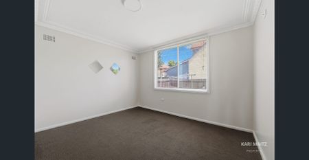 Spacious Four Bedroom Home in Convenient Location - Photo 2