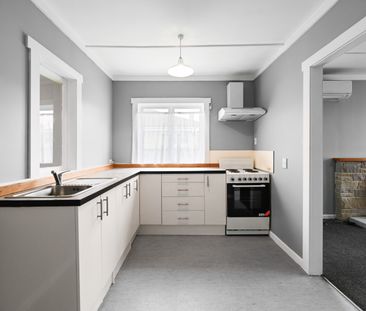 This well-presented home on Karaka Street offers warm, comfortable ... - Photo 1