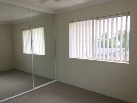 NEAT & TIDY 2 BEDROOM UNIT WITH EXCELLENT SECURITY! - Photo 3