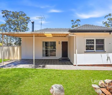 Charming Family Home with Spacious Backyard! - Photo 1