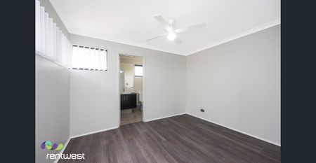 Modern 3-Bedroom Residence with Quality Finishes & Double Garage - Photo 2