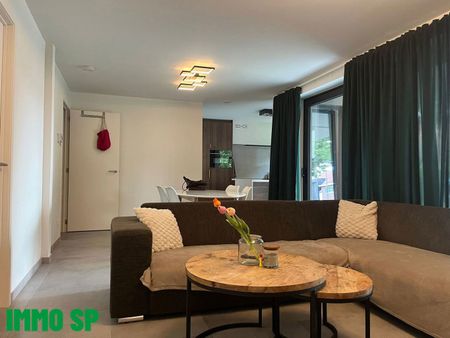 Volledig afgewerkt gelijkvloers appartement met tuintje. - Photo 3