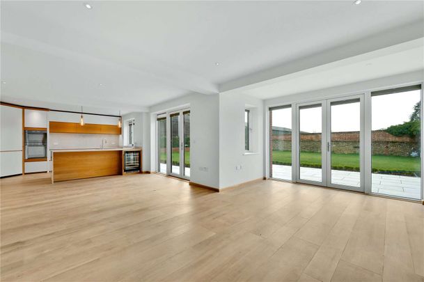 An exceptional newly done four bedroom barn conversion, providing an idyllic countryside setting and spacious and contemporary living accommodation. - Photo 1