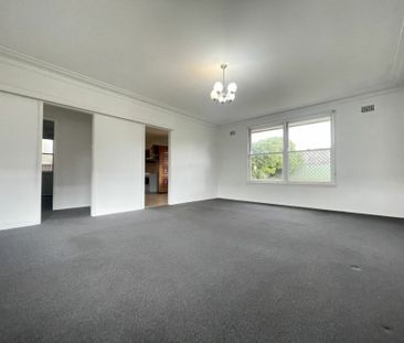 Charming Three-Bedroom Home in a Prime Location - Photo 1