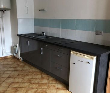 BELLIGNAT, dans copropriété appartement T2 d'environ 55m² avec balcon. - Photo 1