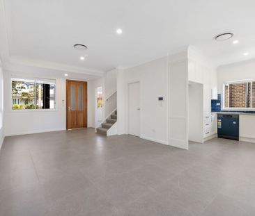 Modern Elegance Meets Spacious Living - Photo 1