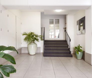 SLEEK STUDIO IN A PRIME VILLAGE SETTING - Photo 1