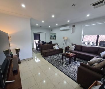 Elevated and Spacious - Photo 1