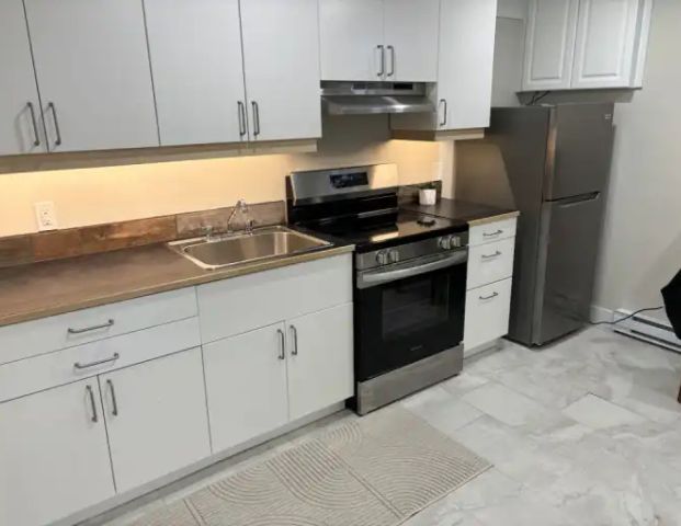 Basement Suite Studio | 1409 Rosehill Drive Northwest, Calgary - Photo 1