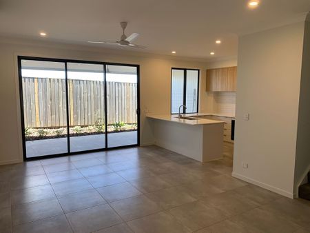 BRAND NEW THREE BEDROOM TOWNHOUSE IN AN ELEVATED POSITION - Photo 2