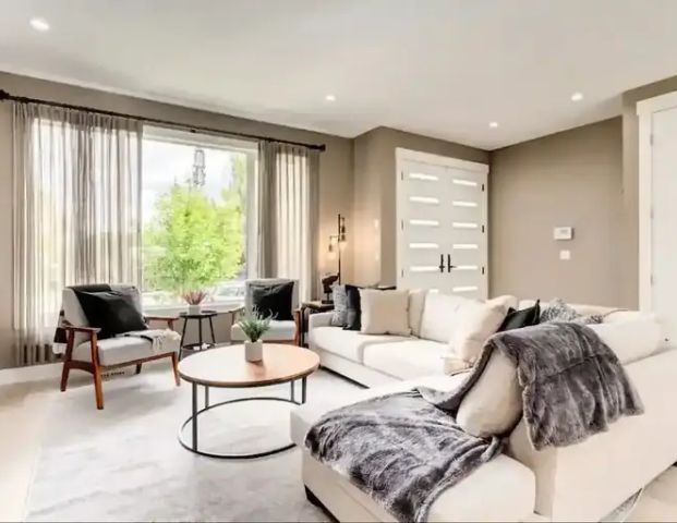 Luxurious 6-bedroom, 3.5-bathroom duplex located in the heart of Renfrew | 1209 Renfrew Drive Northeast, Calgary - Photo 1