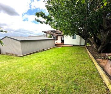 COSY FAMILY HOME PACKED WITH FEATURES! - Photo 1