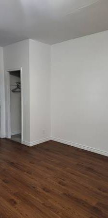 BACHELOR APARTMENT WITH WALKOUT BALCONY IN A HOUSE - Photo 1