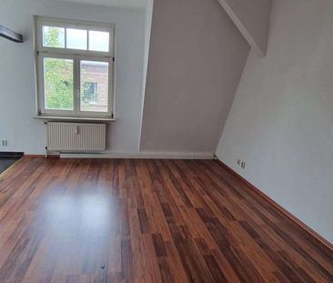 Gemütliche Dachgeschosswohnung wartet auf Ihren Einzug - Photo 1