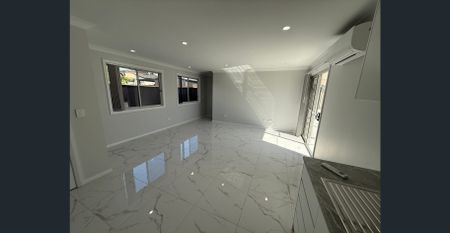 Fresh, Modern Living: New 2-Bedroom Granny Flat with Aircon - Photo 3