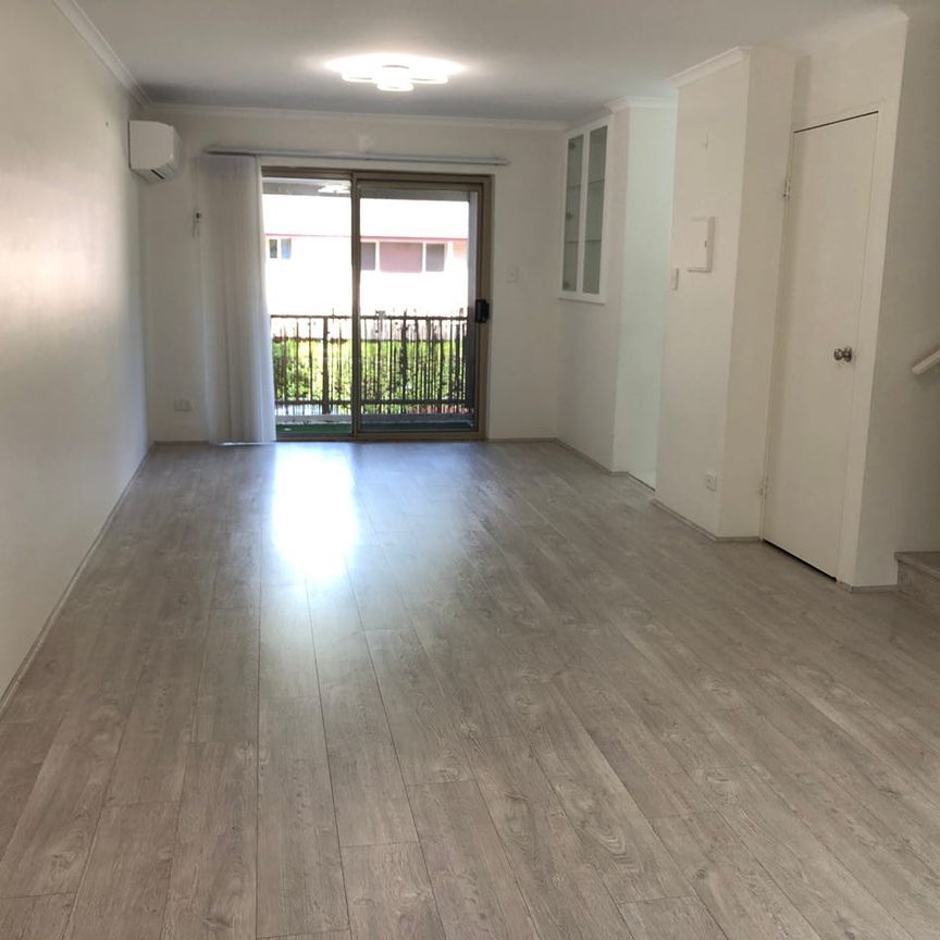 Stylish Renovated Three-Bedroom Townhouse - Photo 1