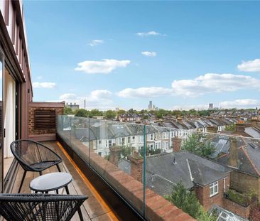 A stunning three bedroom penthouse with views across London - Photo 1