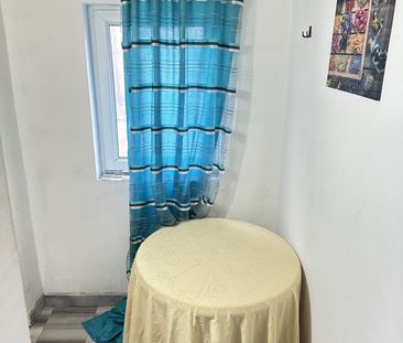 Garsonieră spațioasă cu facilități și grădină - Fotografie 4