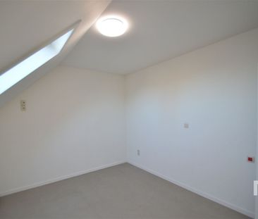 Recent appartement met zicht op het dorpsplein - Photo 1