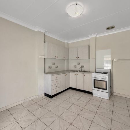 NEAT & LOW-MAINTENANCE FLAT IN GREAT LOCATION - Photo 4