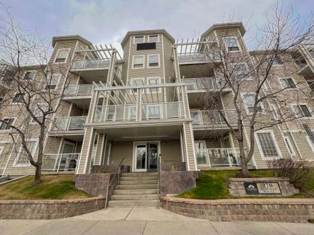 Spacious 2 Bed, 2.5 Bath Condo In Shawnessy | Fireplace, Balcony & Rent Incentive - Photo 5