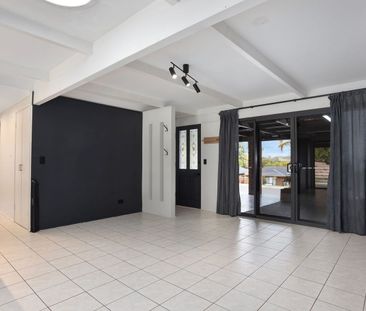 Summer Ready – Family Home with Sparkling Pool - Photo 1