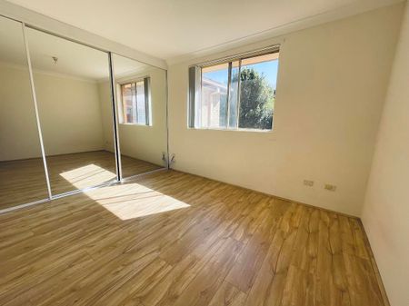 Split Level 2 Bedroom Townhouse With Open Car Space !!! - Photo 2