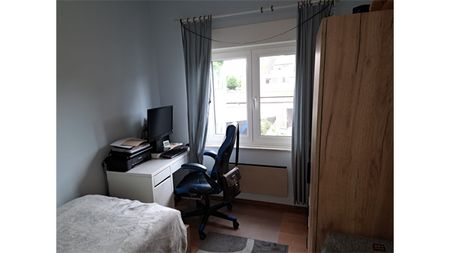 Een appartement op de eerste verdieping met garage en tuintje - Photo 3