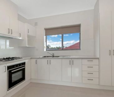 Nicely renovated, clean & spacious two bedroom unit! - Photo 1