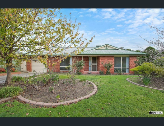 Peace and quiet surrounds this Family Home - Photo 1
