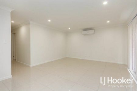 Modern Family Home with Stylish Finishes & Low-Maintenance Living - Photo 5