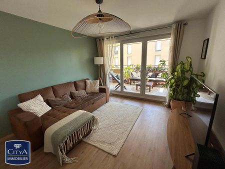 Appartement à louer 4 pièces 74.05m² - Photo 2