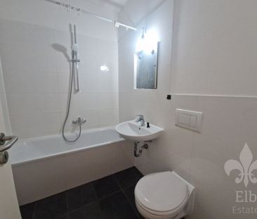 Hochparterre - Wohnung mit 2 Zimmern, offener Küche und Balkon in N... - Foto 4